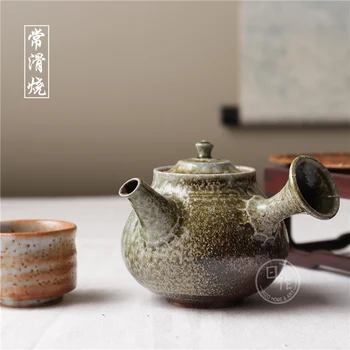 Japonya'dan ithal edilen yanık çaydanlık ünlü nakagawa pahalı koymak sır asmak için manuel yakacak odun bir pot sürer